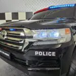 Elektrische kinderauto Toyota Land Cruiser Politie